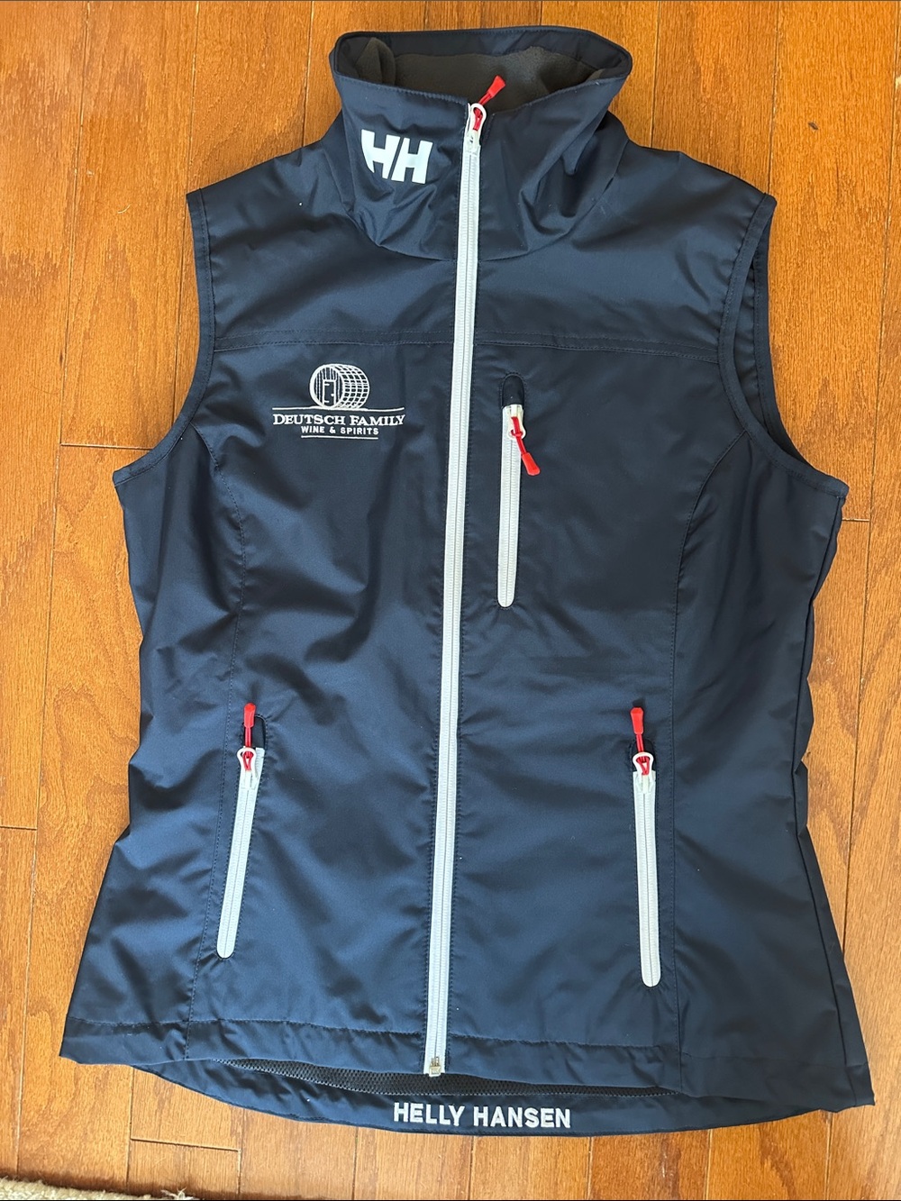 Helly Hansen Navy Shell Vest with White Zippers and Red Pulls